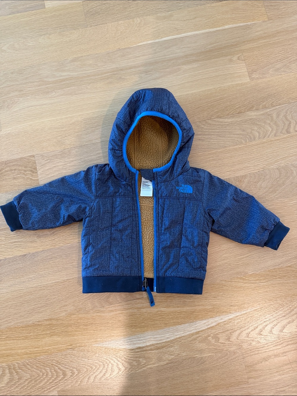 The North Face Navy Reversible Blue Hooded Puffer with Tan Sherpa 6-12 mo
